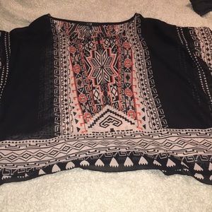 Sheer poncho style top